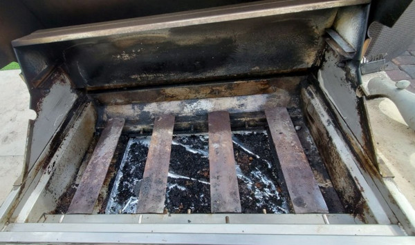 Dirty before picture of a grill.