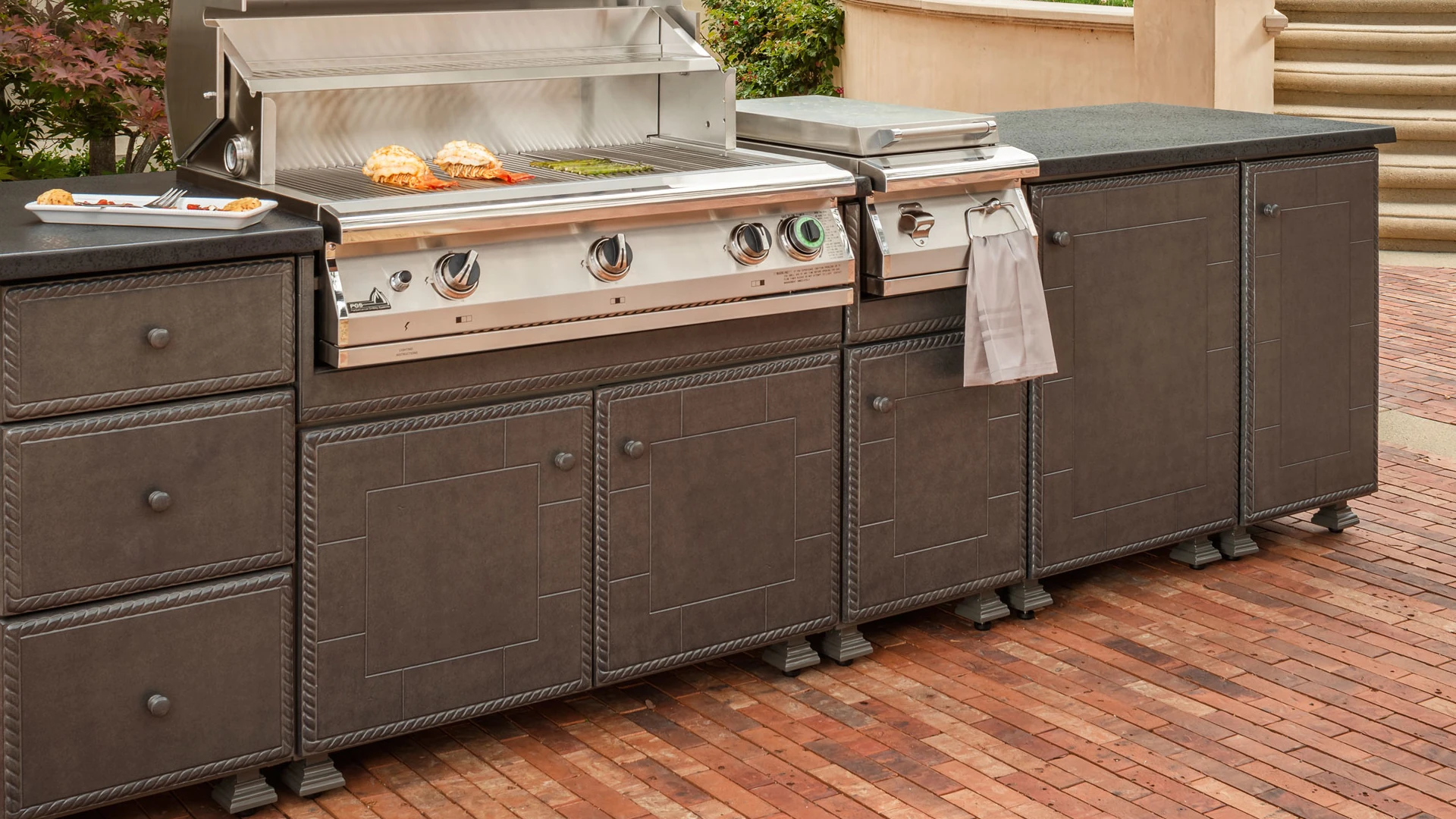 A zoomed in shot of the drawers on grill island.